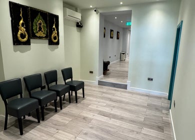 Chic waiting area at Na Siam Spa, London, England, GB with elegant chairs and serene decor.