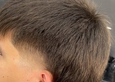Close-up of a precise fade haircut at King of Fades, Royston, England, GB showcasing expert barbering skills.