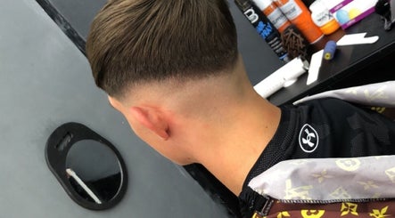 Close-up of a precision haircut at King of Fades, Royston, England, GB showcasing a sleek fade style.