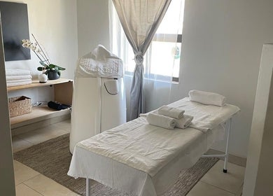 Tranquil massage room at Massage by Rich, Randburg, Gauteng, ZA with a neatly arranged massage table.
