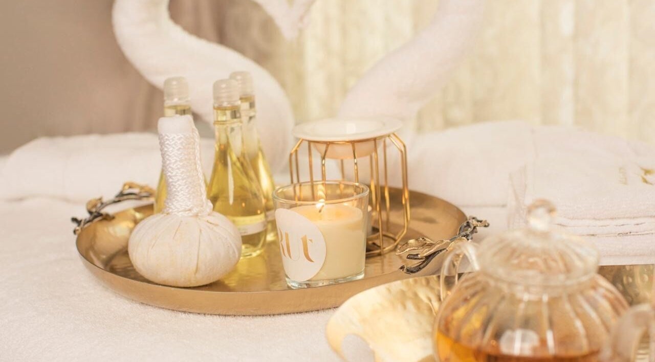 Luxurious spa tray at RUT SPA with oils and candles in Al Khobar, Eastern Province, SA.