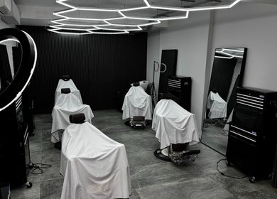 Barber chairs at Barberesso, stylish grooming space in London, England, GB.