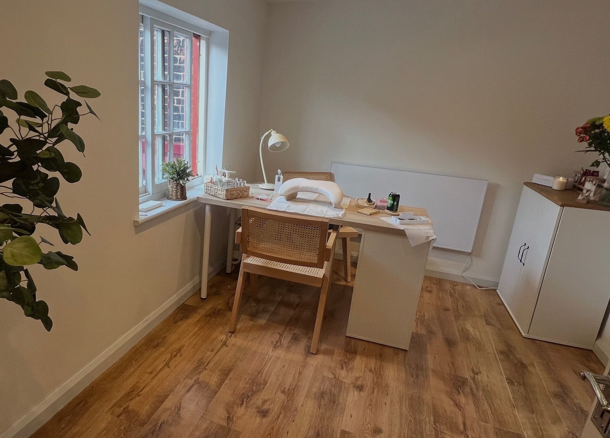 Cozy manicure station at The Nail Studio By Kim, Leek, England, GB, featuring stylish decor and bright lighting.