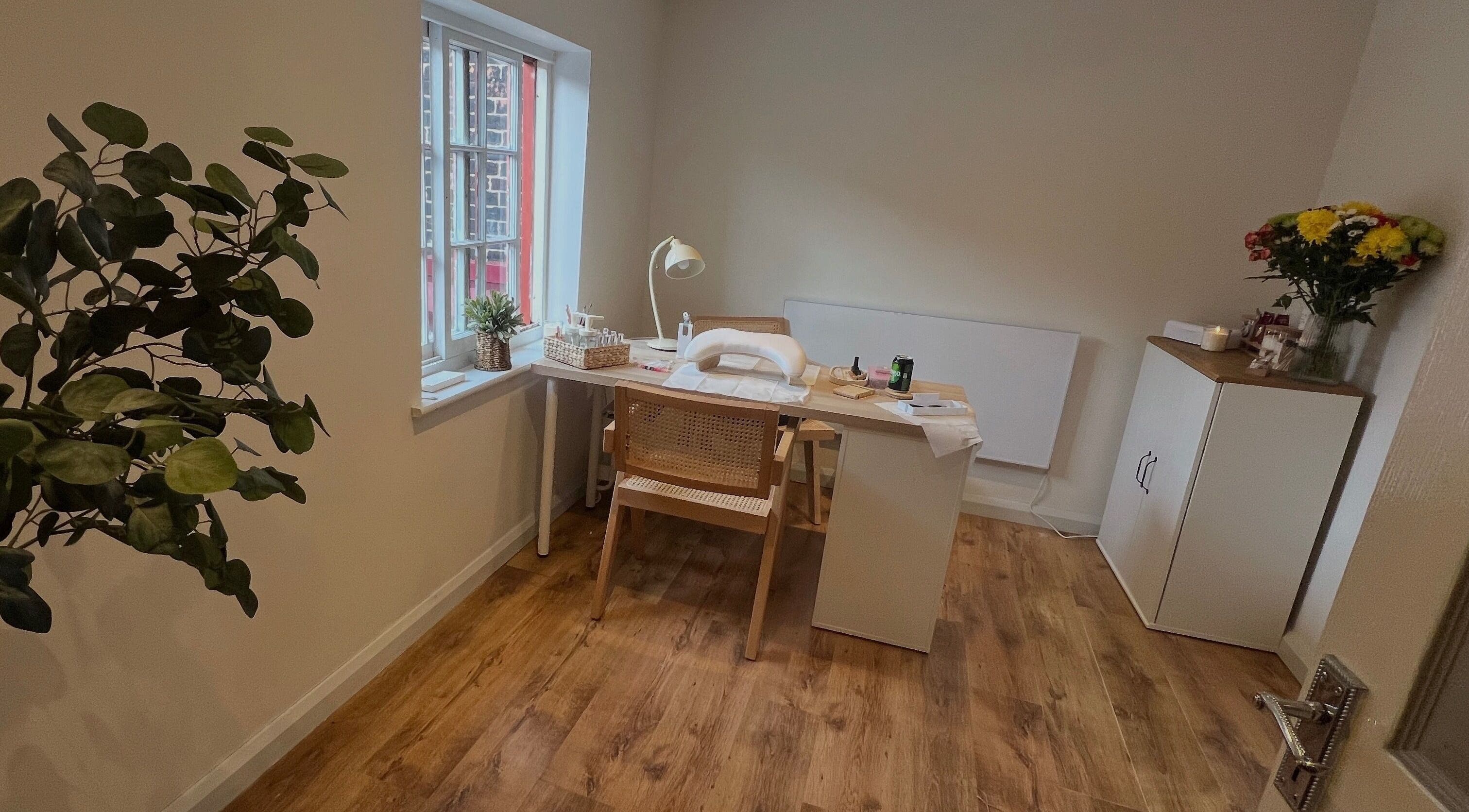 Cozy manicure station at The Nail Studio By Kim, Leek, England, GB, featuring stylish decor and bright lighting.