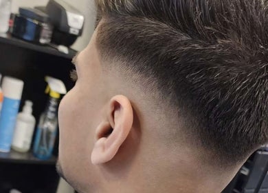 Close-up of a trendy fade haircut at RCutsBarberShop in Hamilton, Ontario, CA.