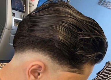 Sharp fade haircut at RCutsBarberShop in Hamilton, Ontario, CA showcasing modern grooming techniques.