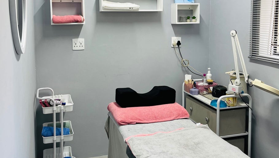 Peaceful treatment room at Melovely Beauty Salon in Jeffreys Bay, Eastern Cape, ZA, showcasing modern facilities.