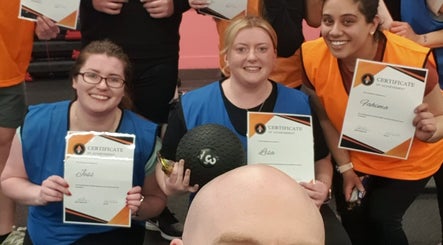 Group holding certificates at Burn With Jeff - Personal Training in Stretford, England, GB.