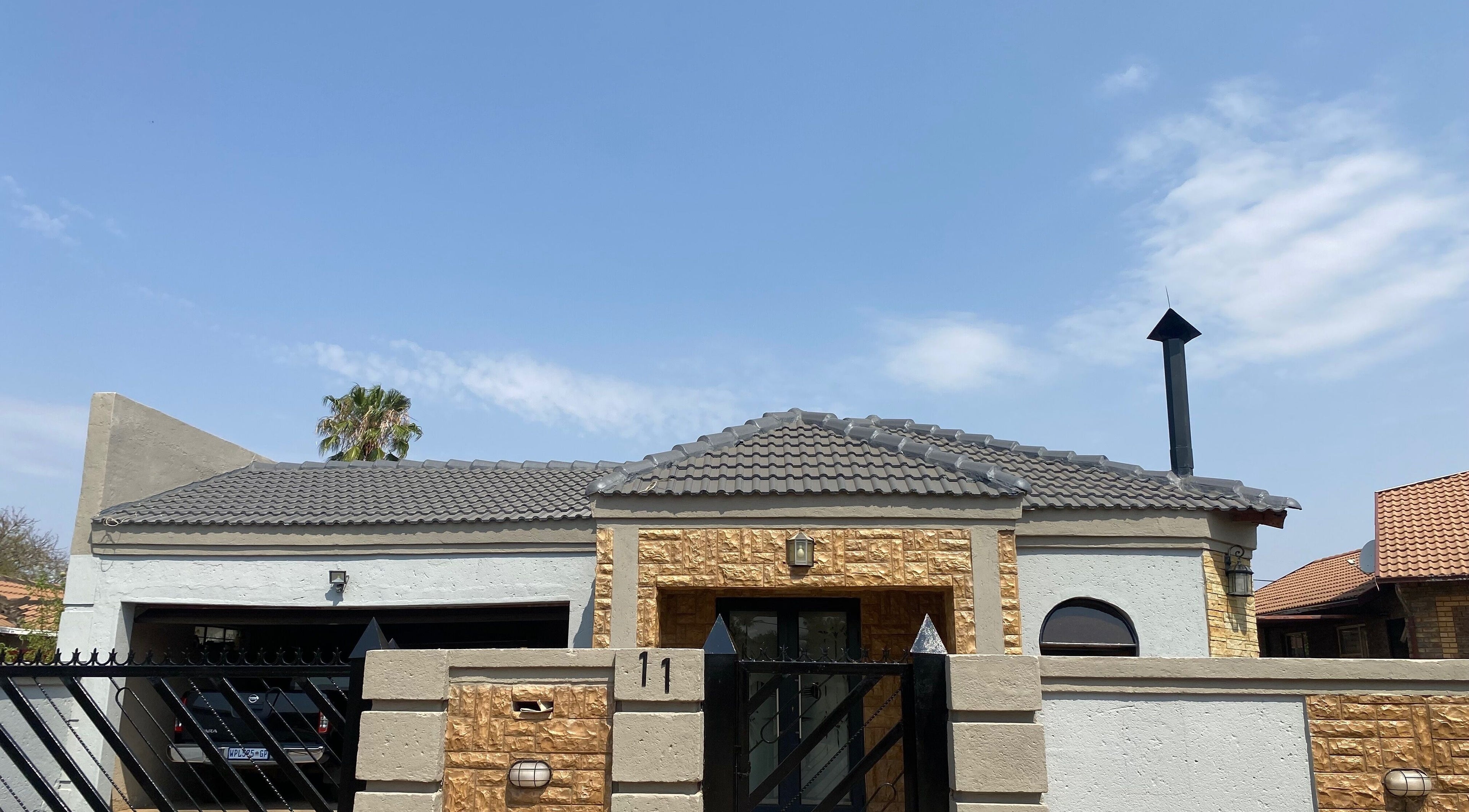 Elegant exterior of Clawed._ in Akasia, Gauteng, ZA with modern architectural design.