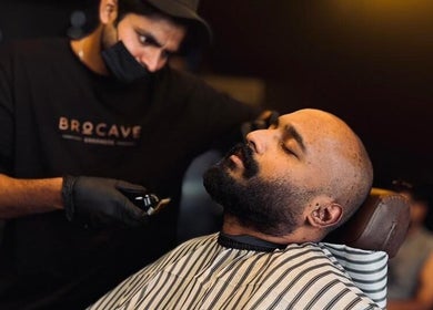 Professional grooming service at Brocave Groomers, Dubai, Dubai, AE, featuring a relaxing shave experience.