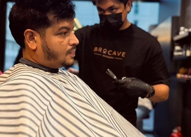 Professional grooming at Brocave Groomers in Dubai, Dubai, AE with a customer receiving a haircut.