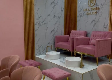 Elegant pedicure section with pink chairs at Nail Tribe Salon, Kingston, St. Andrew Parish, JM.