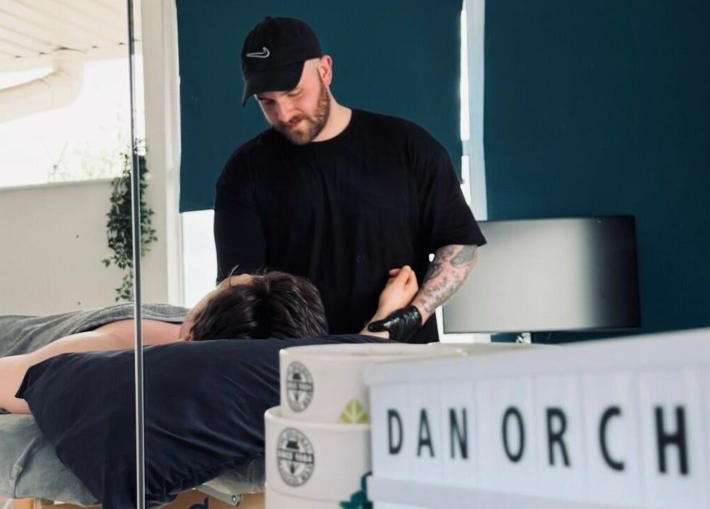 Therapist providing a massage at Dan Orchard Sports Massage, Exeter, England, GB.