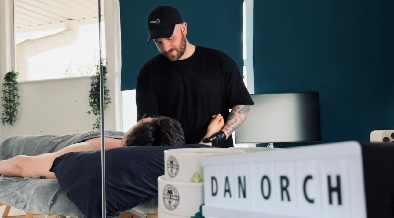 Therapist providing a massage at Dan Orchard Sports Massage, Exeter, England, GB.