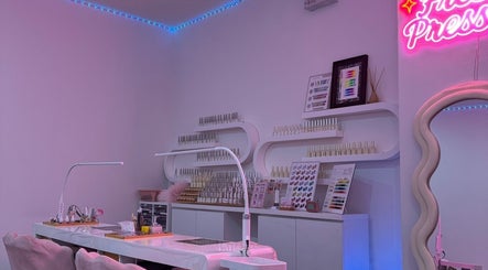 Elegant nail salon setup at Fresh Pressed, Singapore, Singapore, SG, with chic decor and vibrant tools.