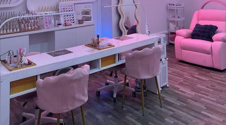Elegant nail salon interior with pink chairs at Fresh Pressed in Singapore, Singapore, SG.