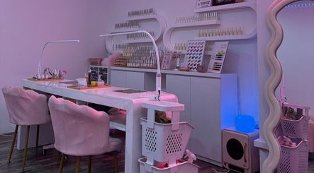 Elegant nail studio at Fresh Pressed, Singapore, SG, featuring chic decor and nail polish display.