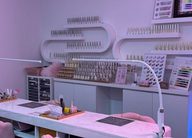 Modern nail studio at Fresh Pressed, Singapore, SG featuring stylish decor and nail polish displays.