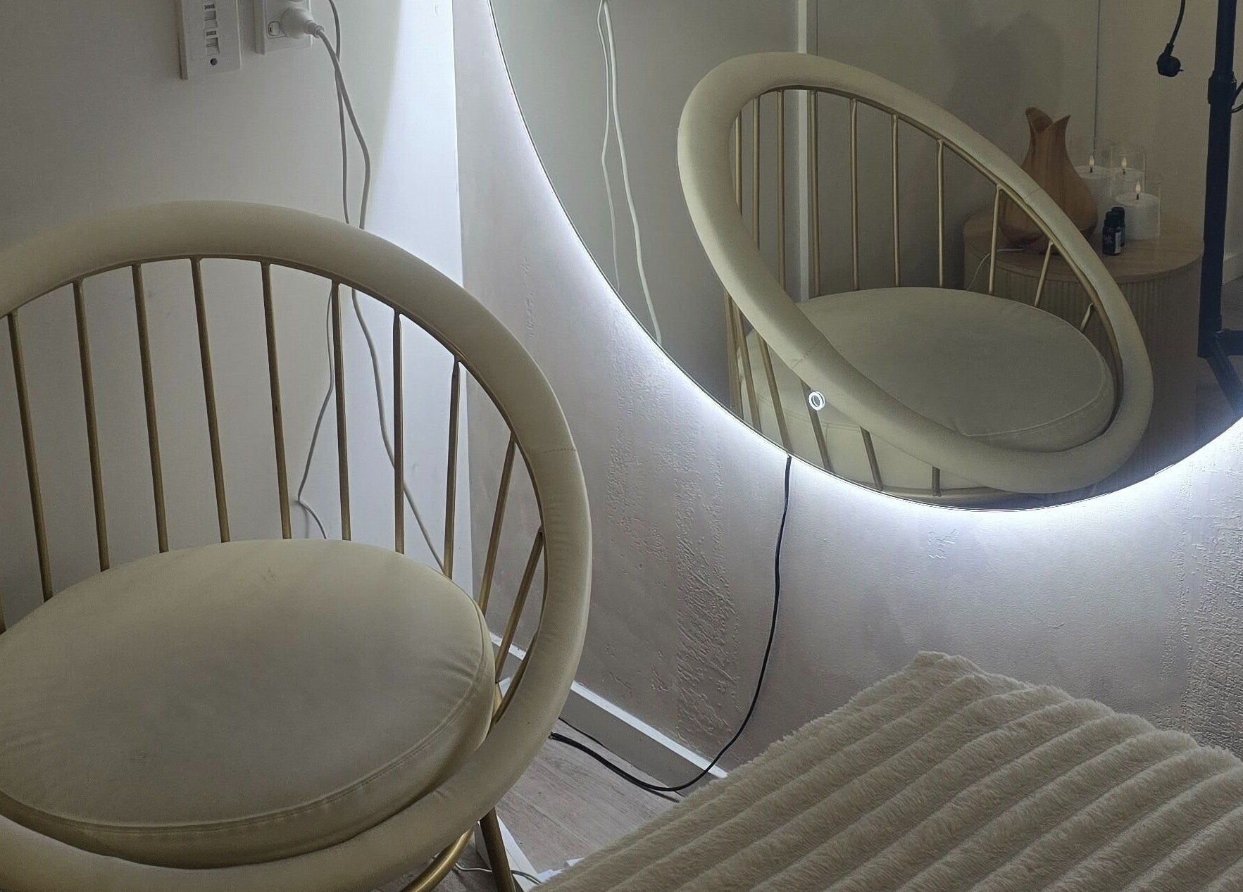 Elegant chair and mirror setup at Bella's Beauty, Christchurch, Canterbury Region, NZ.