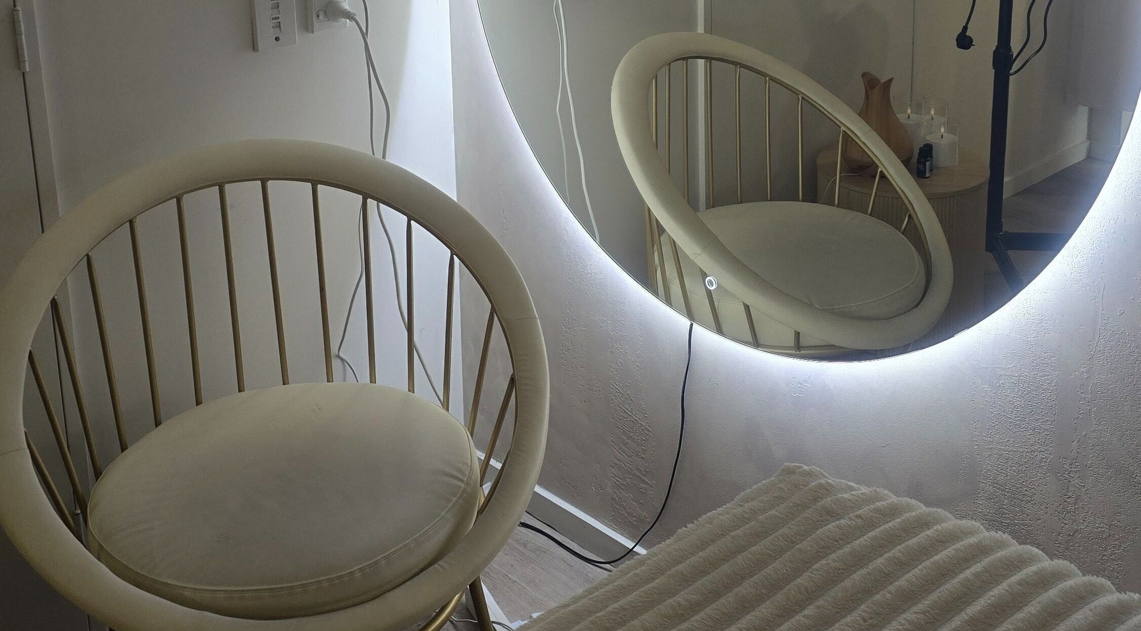 Elegant chair and mirror setup at Bella's Beauty, Christchurch, Canterbury Region, NZ.