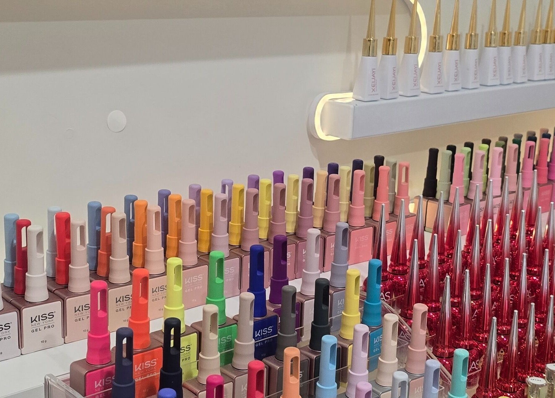 Vibrant nail polish collection at Bella's Beauty, Christchurch, Canterbury Region, NZ.