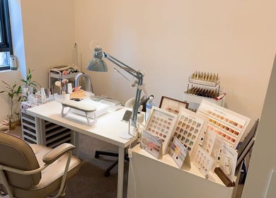 HALO NAIL STUDIO workspace in Rouse Hill, New South Wales, AU featuring chic decor and organized nail supplies.