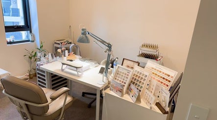 HALO NAIL STUDIO workspace in Rouse Hill, New South Wales, AU featuring chic decor and organized nail supplies.