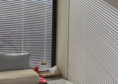 Relaxing seating area at Onyu Nail Studio, Sydney, New South Wales, AU, with natural light and plush cushion.