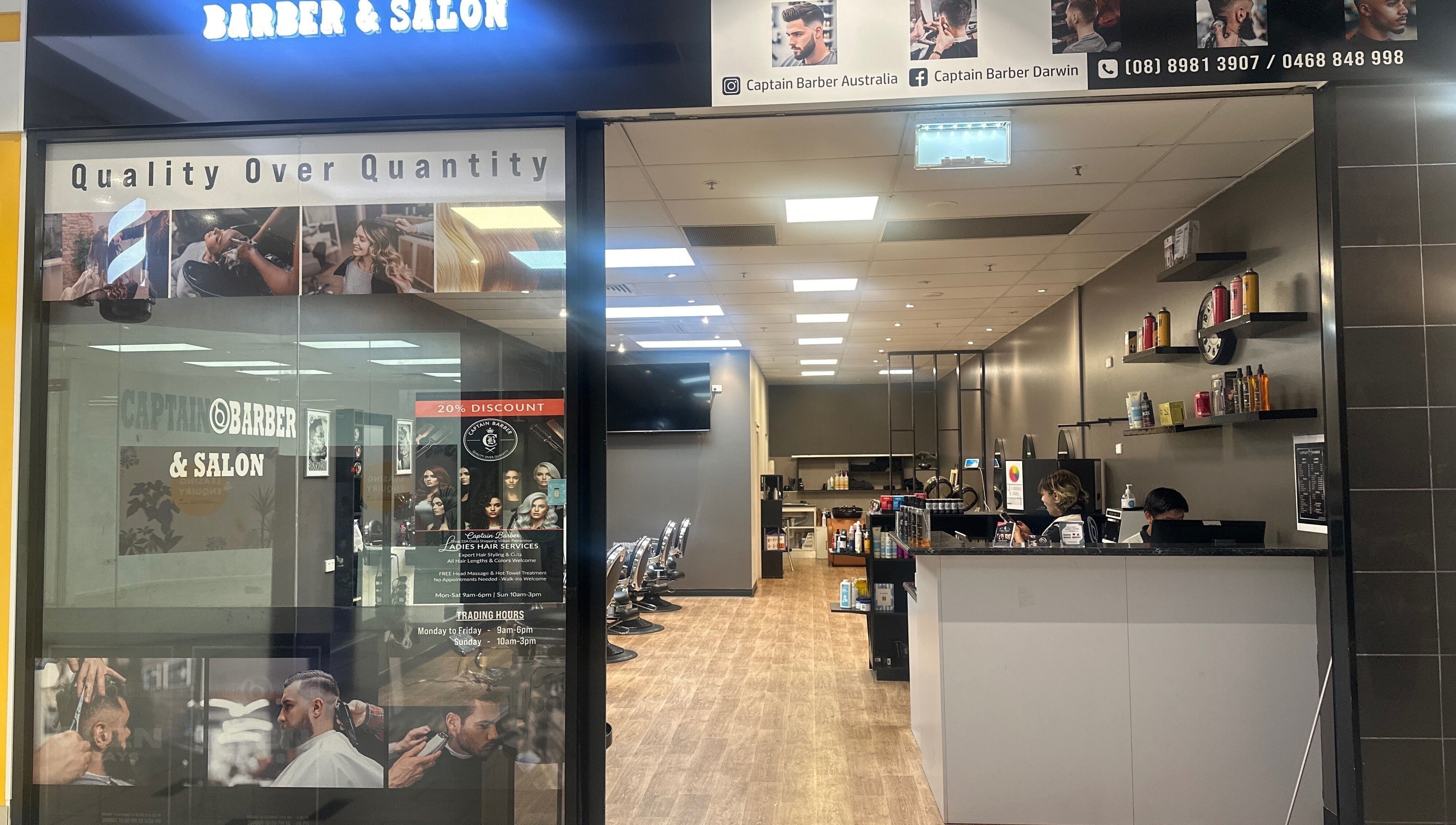 Interior view of Captain Barber Oasis in Palmerston City, showcasing modern chairs and stylish decor.