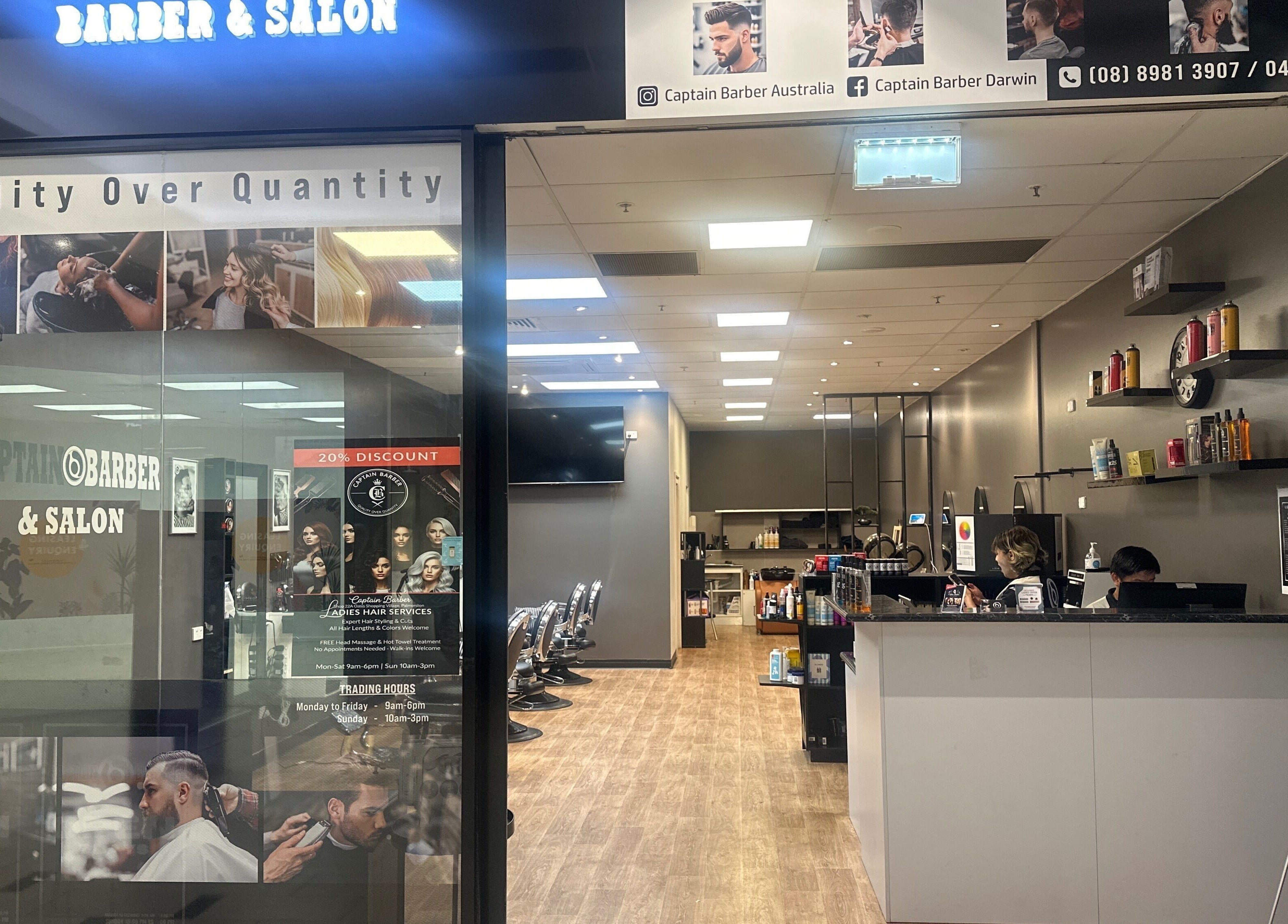 Interior view of Captain Barber Oasis in Palmerston City, showcasing modern chairs and stylish decor.
