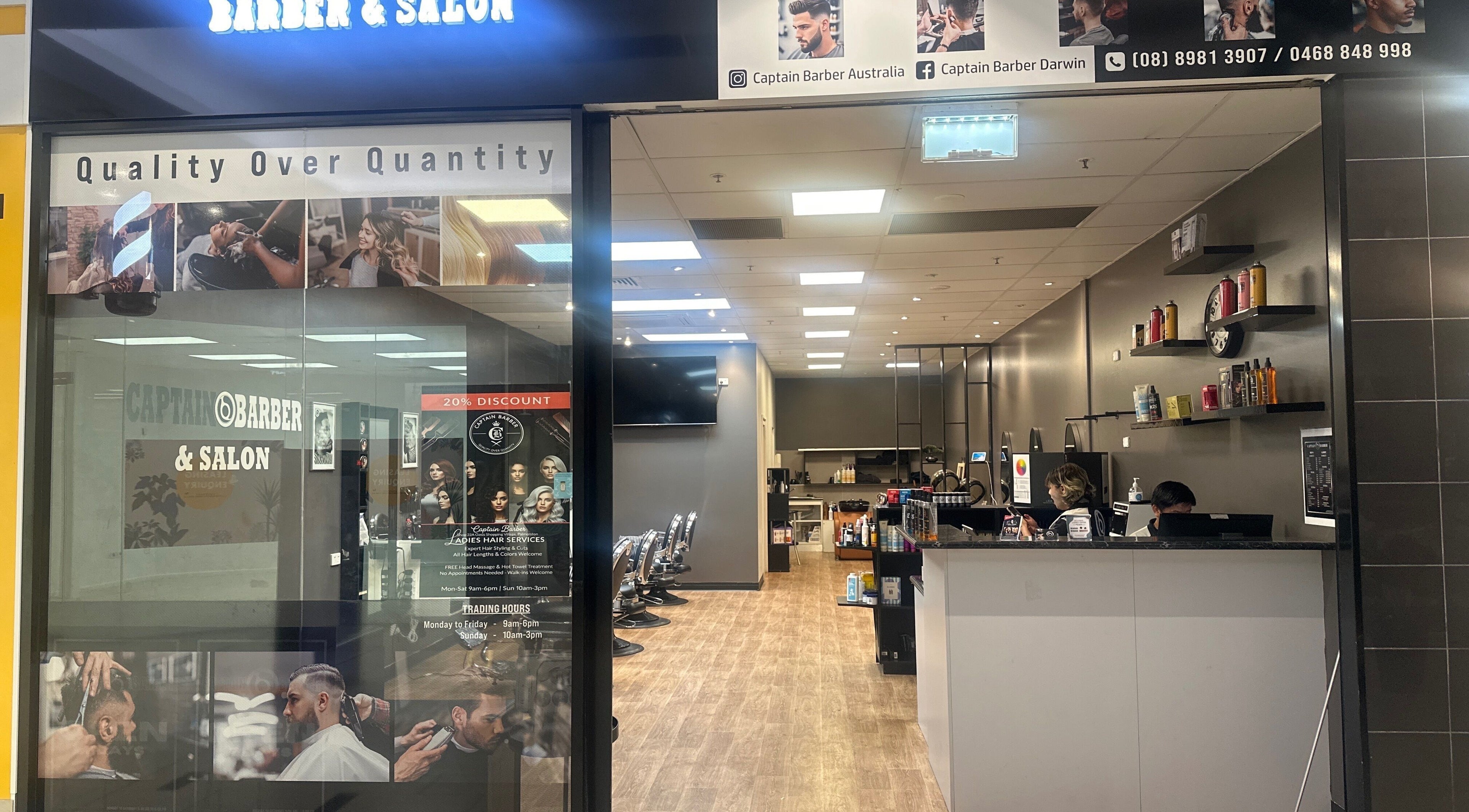 Interior view of Captain Barber Oasis in Palmerston City, showcasing modern chairs and stylish decor.