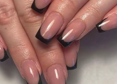 Chic black French manicure at Studio Cassia 21, Mansfield, England, GB.