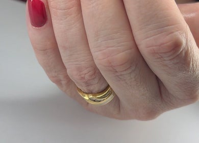 Close-up of an elegant red manicure at Studio Cassia 21, Nuthall, England, GB.