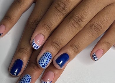 Elegant blue and dotted nail art at Studio Cassia 21, Nuthall, England, GB.