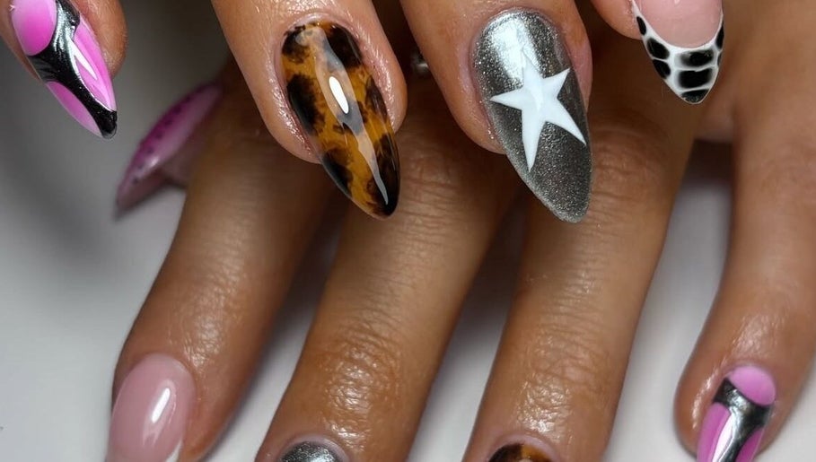 Creative nail design at Nails By Ellise in Airdrie, Scotland, GB showcasing colorful and unique patterns.