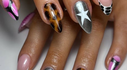 Creative nail design at Nails By Ellise in Airdrie, Scotland, GB showcasing colorful and unique patterns.