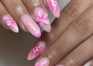 Floral nail art design at Nails By Ellise, Airdrie, Scotland, GB features pink petals and delicate accents.