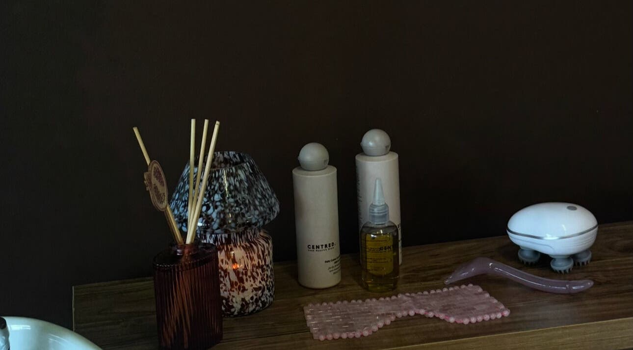 Beauty products and tools displayed at Brushed By Amelia, Milford Haven, Wales, GB, evoke a serene atmosphere.