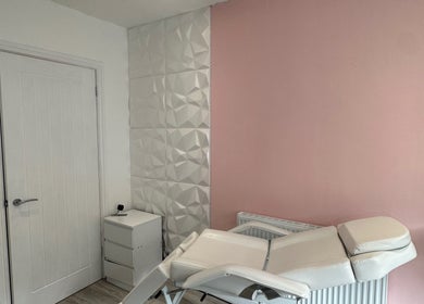 Relaxing treatment room at Studio1_byJordan in Featherstone, England, GB with modern decor and comfortable chair.