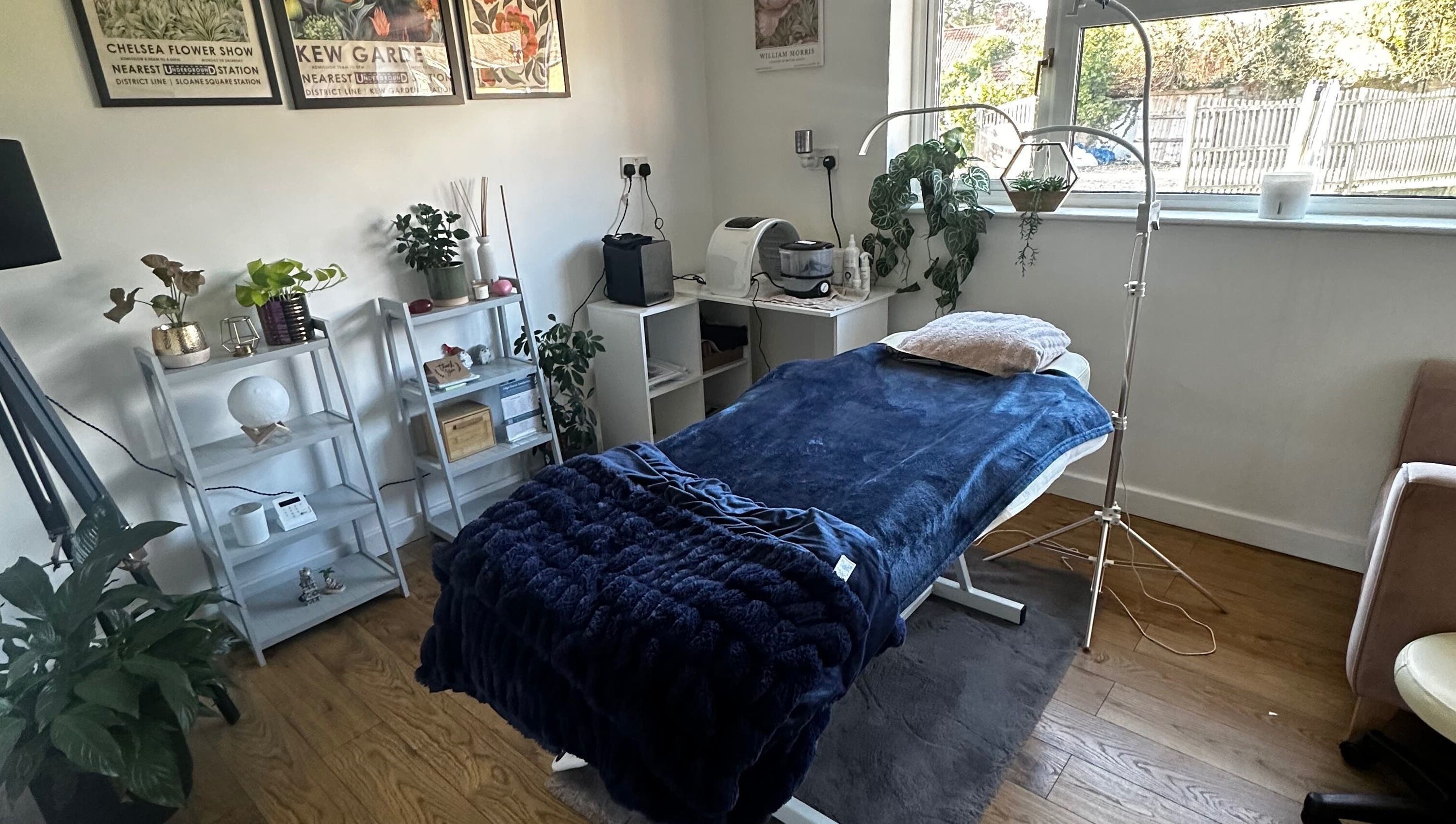 Calming treatment room at Edge Nurse Aesthetics in East Harling, England, GB with cozy bed and soft lighting.