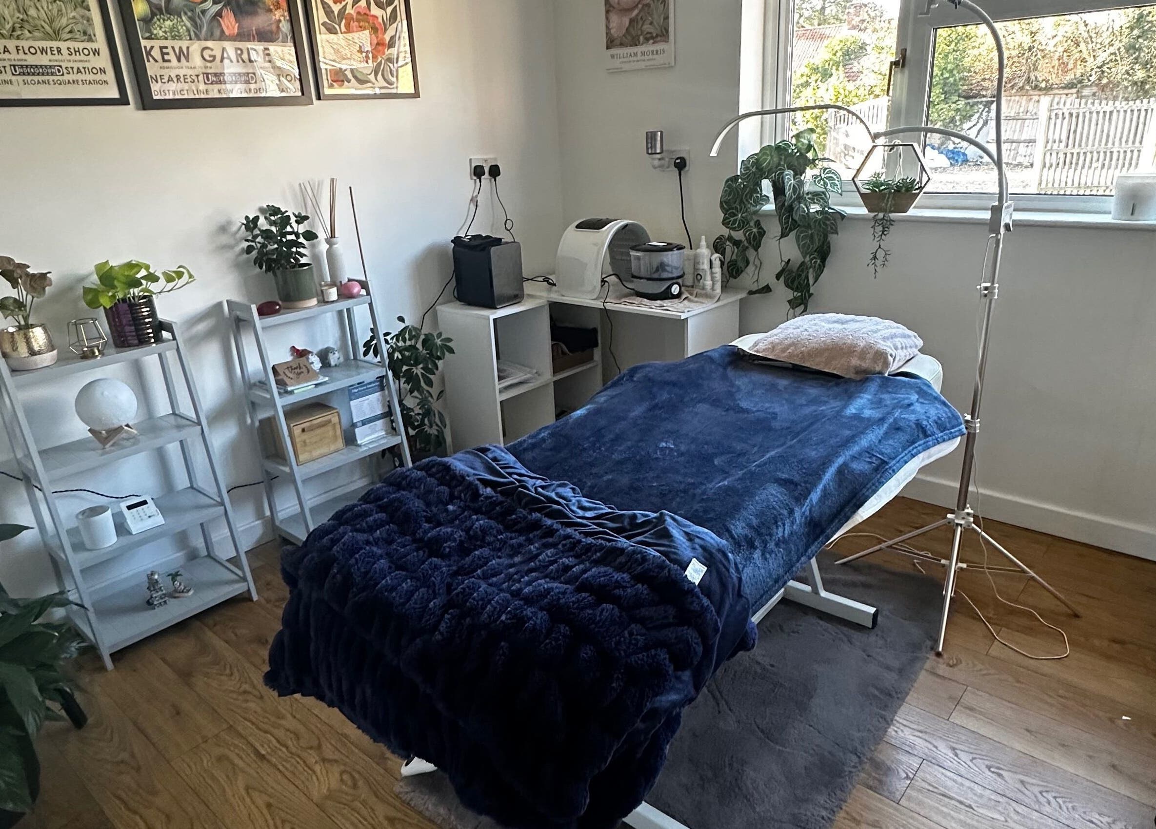 Calming treatment room at Edge Nurse Aesthetics in East Harling, England, GB with cozy bed and soft lighting.
