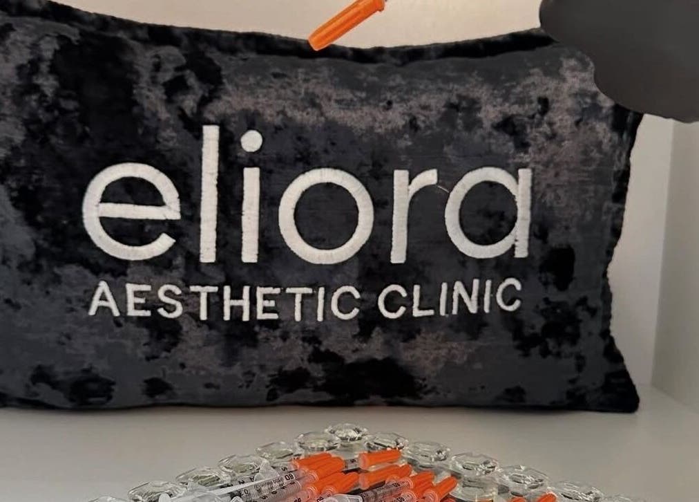 Eliora Aesthetic Clinic's plush pillow and syringes, showcasing a professional setup in Midrand, Gauteng, ZA.