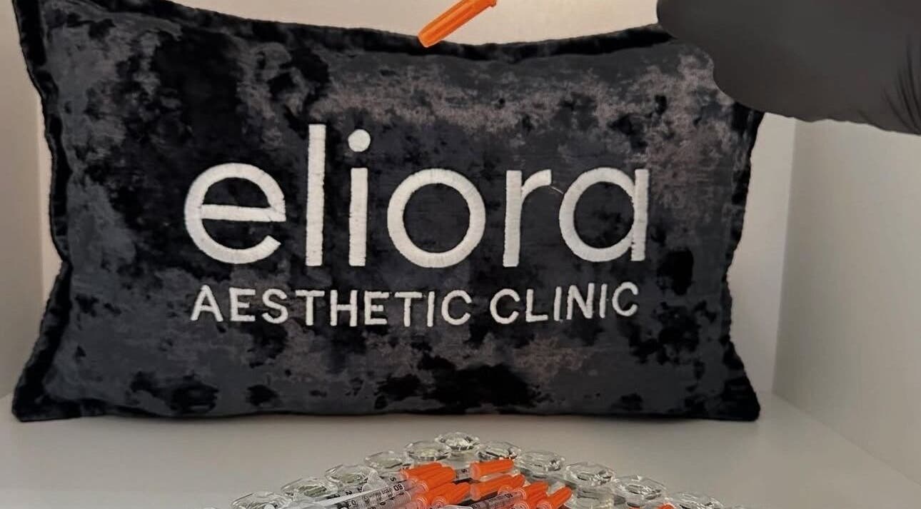 Eliora Aesthetic Clinic's plush pillow and syringes, showcasing a professional setup in Midrand, Gauteng, ZA.