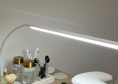 Modern nail station at Nails By RH, Garforth, England, featuring stylish decor and essential tools.