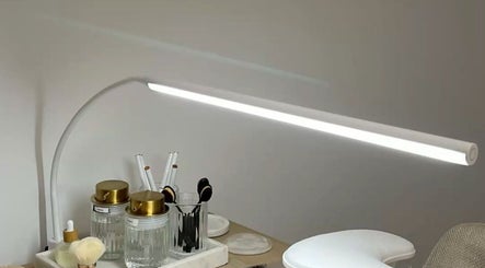 Modern nail station at Nails By RH, Garforth, England, featuring stylish decor and essential tools.