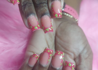 Colorful nail design at GlammedbyPosh, Bridgetown, Saint Michael, BB with pink and green patterns.