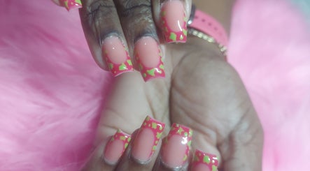 Colorful nail design at GlammedbyPosh, Bridgetown, Saint Michael, BB with pink and green patterns.