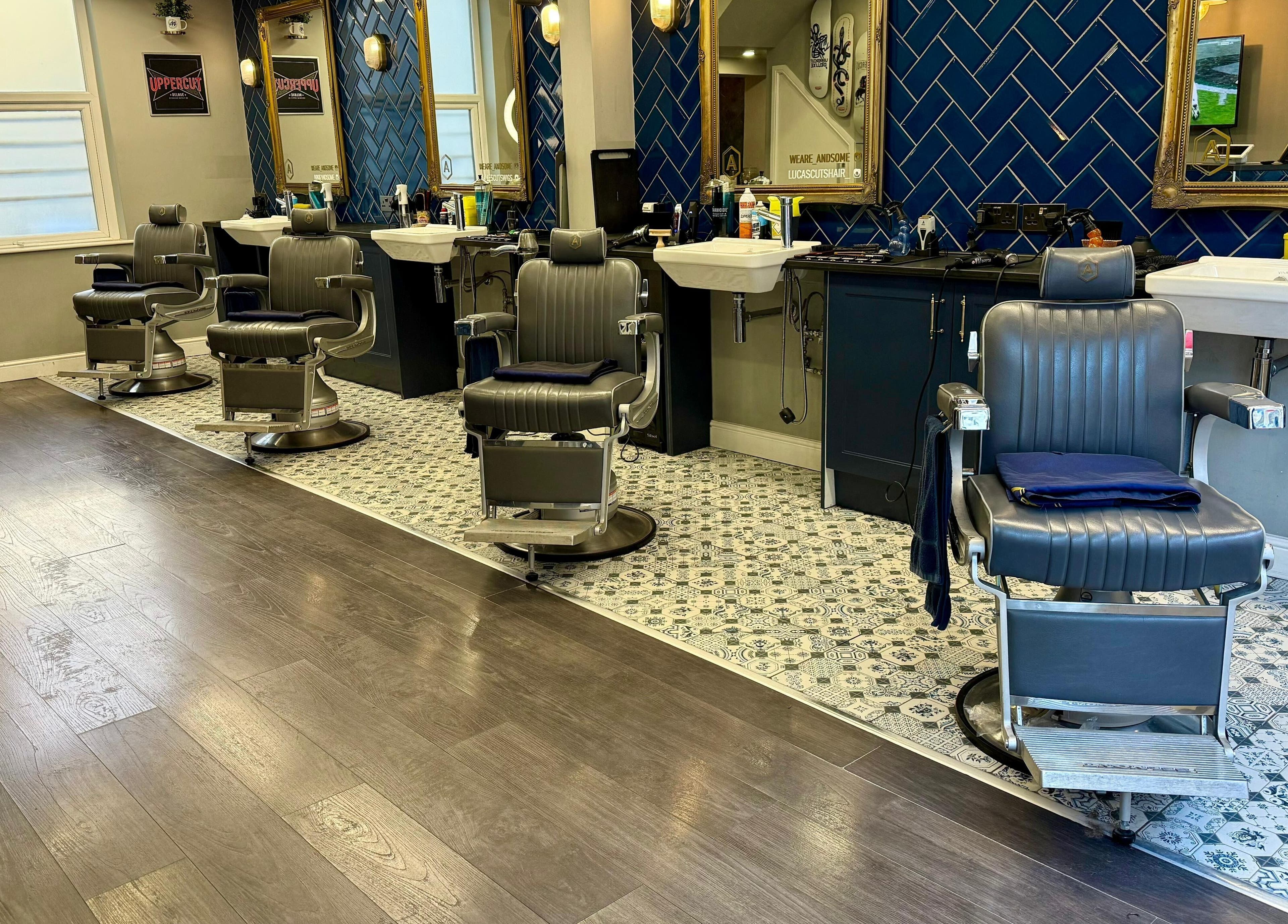 Andsome's sleek barber chairs and decor in Blackpool, England, GB, showcasing modern elegance in grooming.