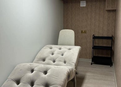 Calming treatment room with plush bed at AK LUNĖ, Aberdeen, Scotland, GB.