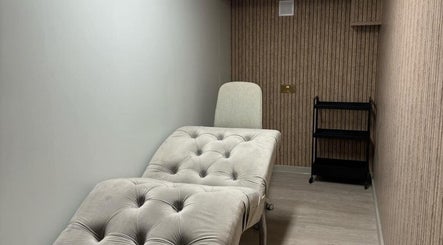 Calming treatment room with plush bed at AK LUNĖ, Aberdeen, Scotland, GB.